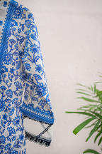Azure Bloom white and royal blue luxury eid pret by Eviline Couture with lacework and embellished neckline