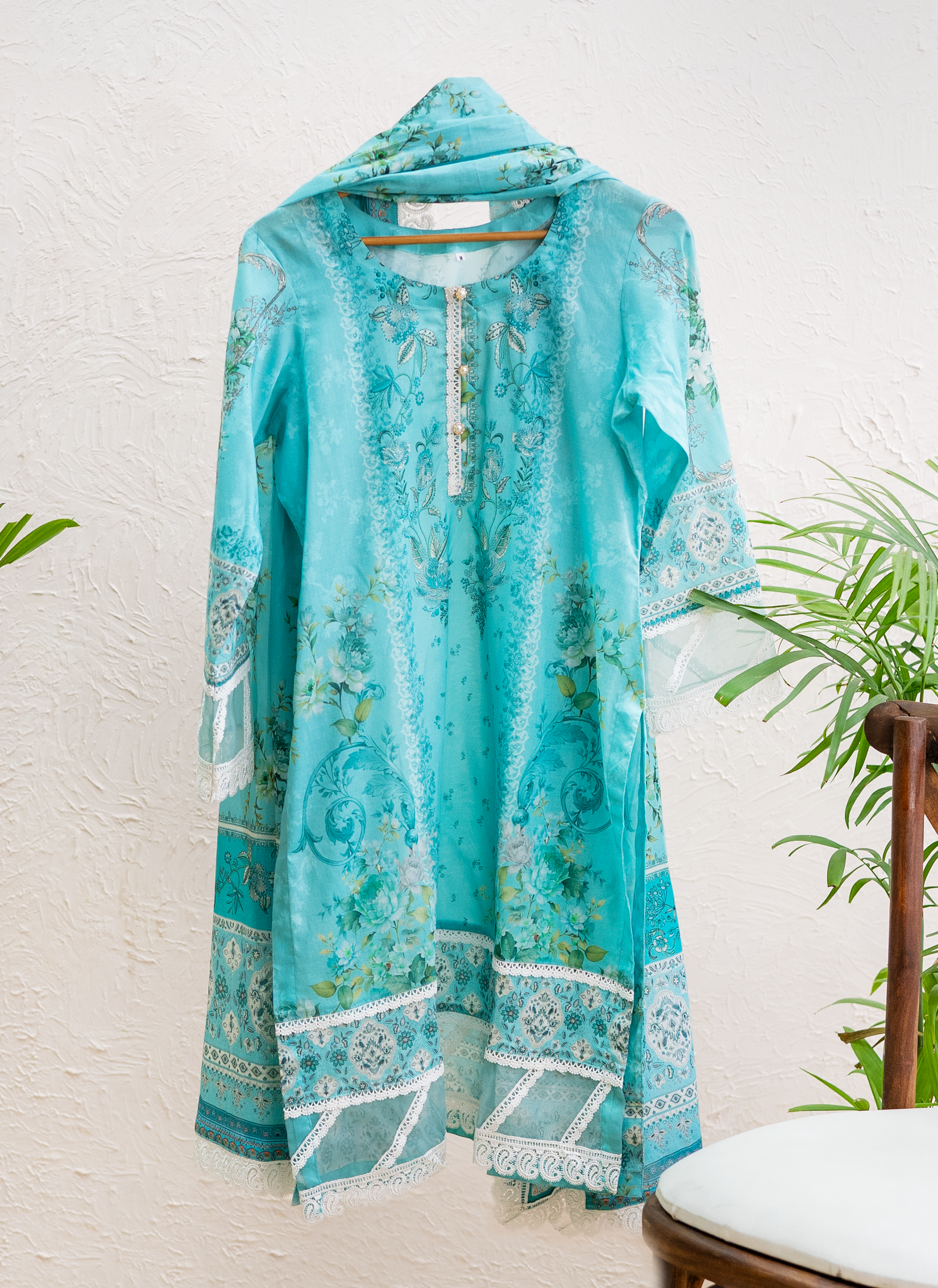 Celeste Aura cyan luxury Eid pret by Eviline Couture with botanical print and lace detailing