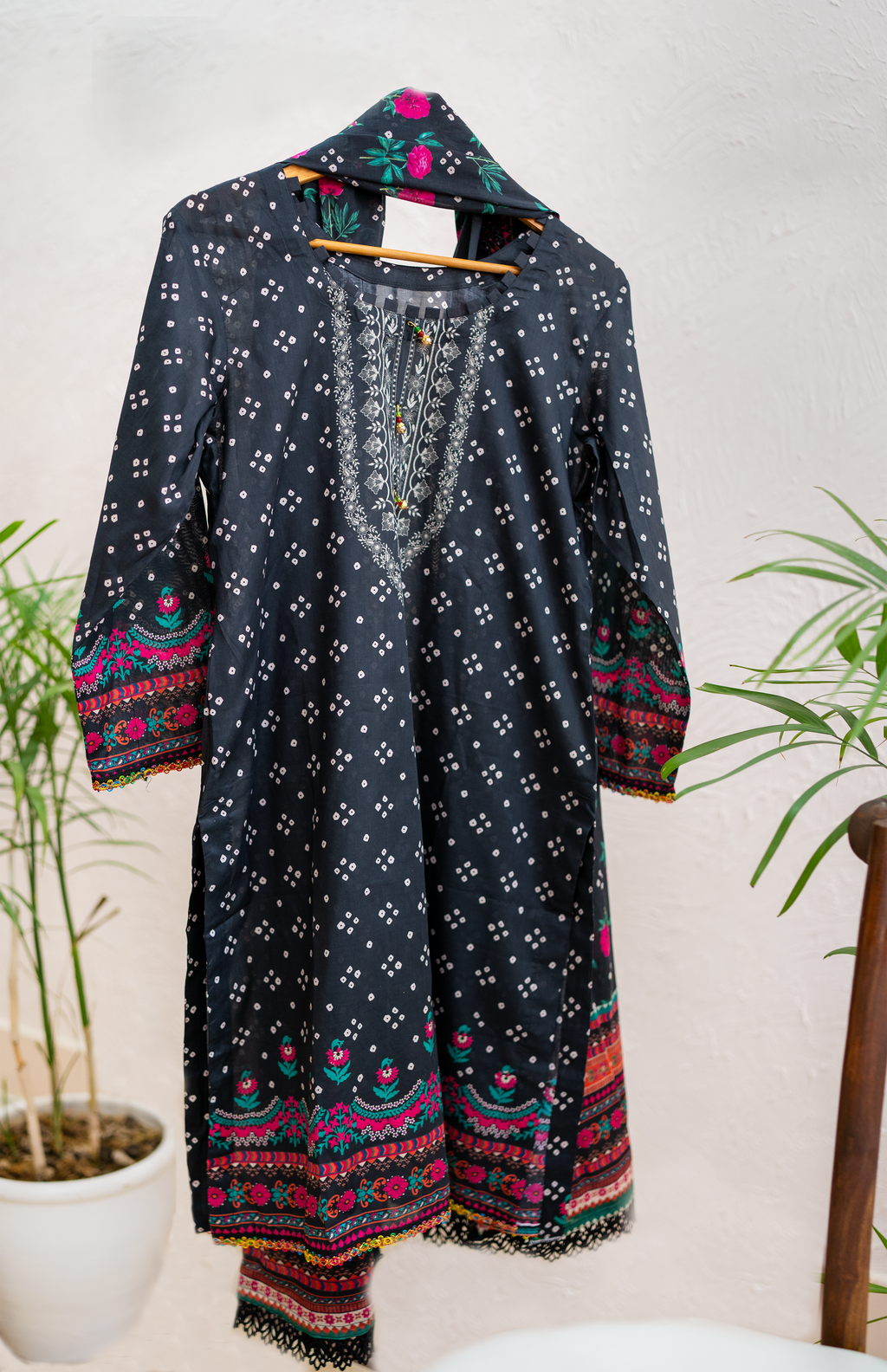 Midnight Noir black luxury Eid pret by Eviline Couture featuring multicolor floral print and lace detailing