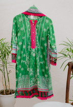 Verdant Grace apple green luxury Eid pret by Eviline Couture with white floral print and lace detailing