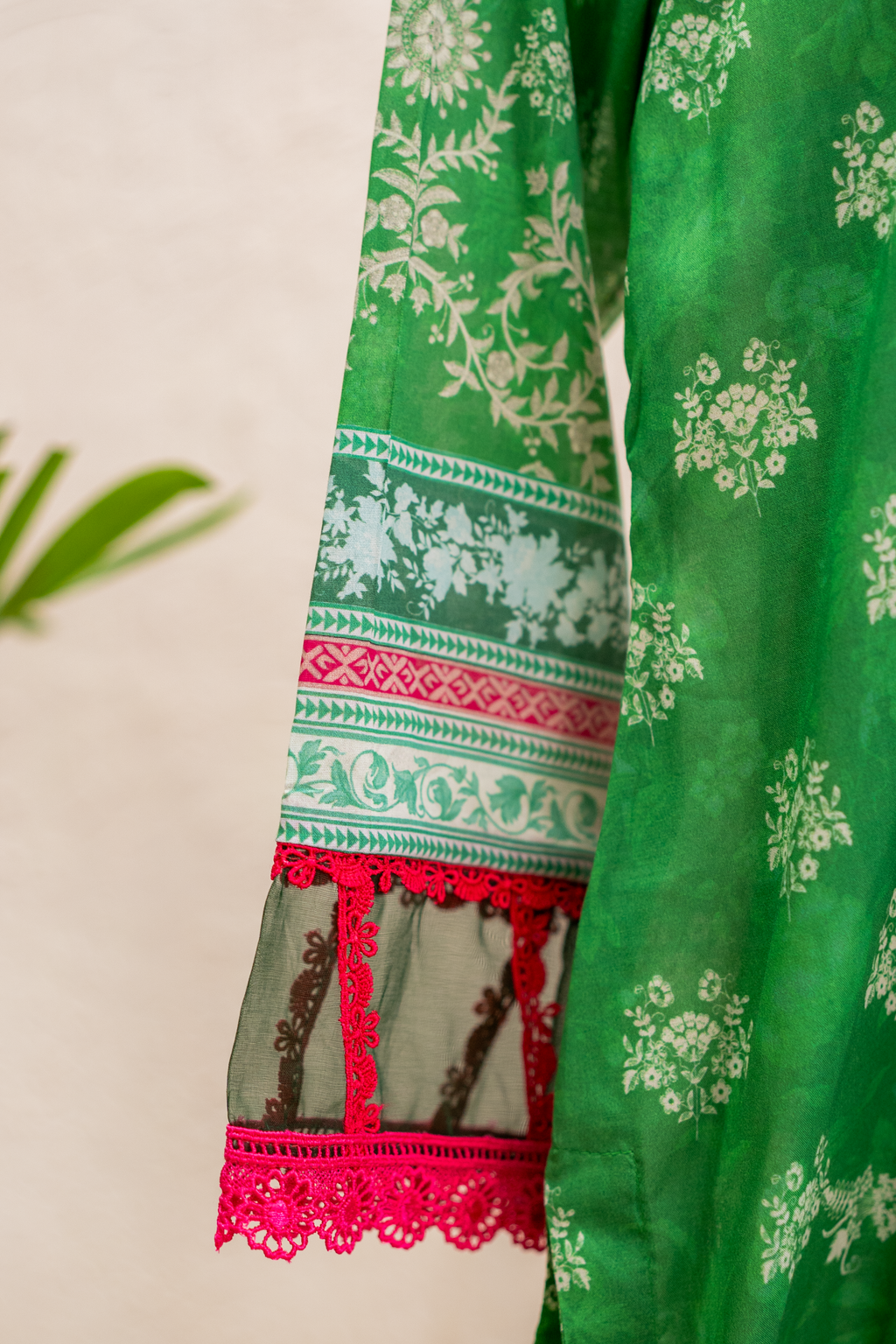 Apple green lawn sleeve with intricate lace finishing